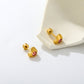 Pink Crystal Heart gold earrings flat lay – 18K gold plated by Twisty Locks