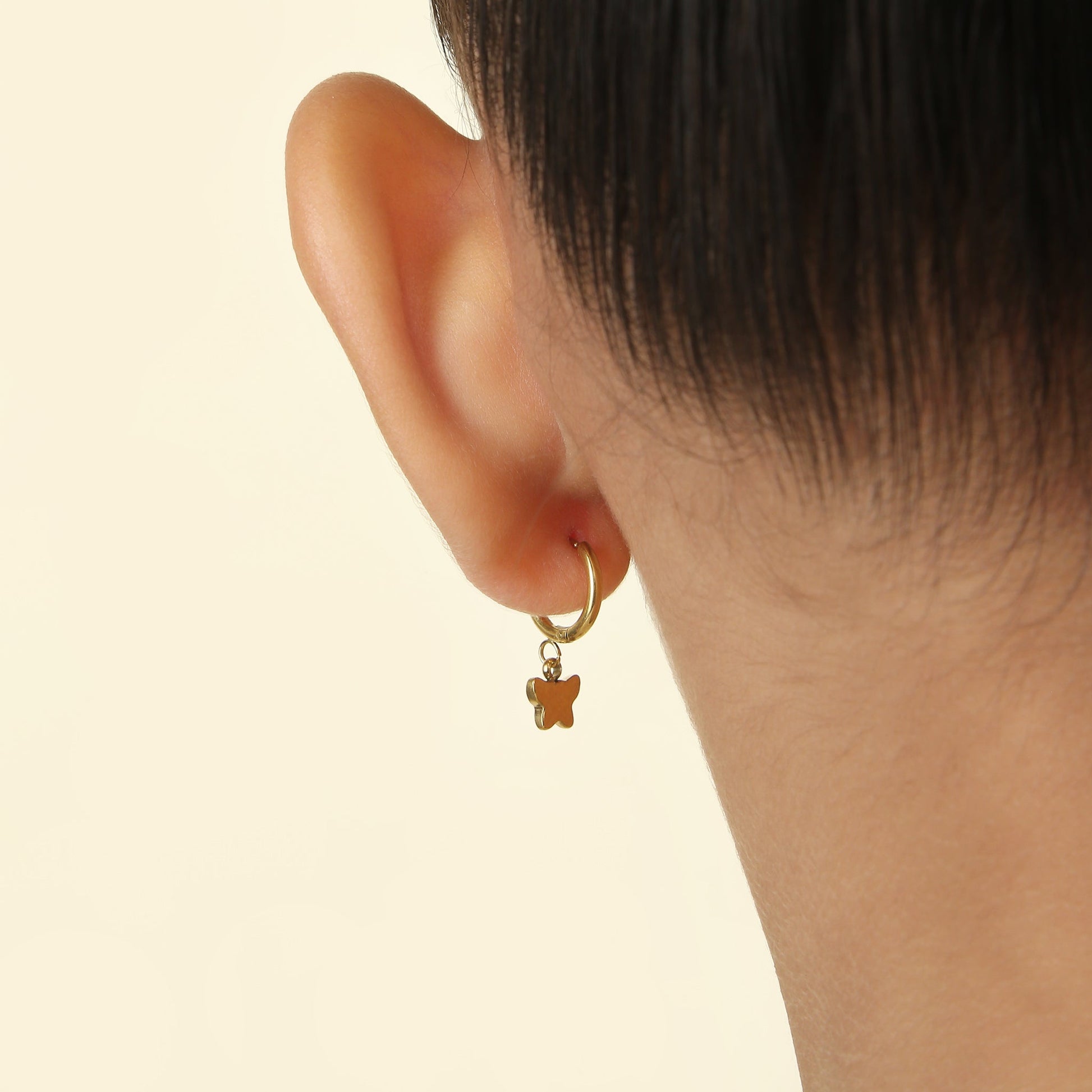 Butterfly Hoops gold earrings flat lay – poke free children's earrings by Twisty Locks