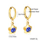 Sapphire Flower Hoops gold earrings detail – sapphire floral hoop close-up by Twisty Locks